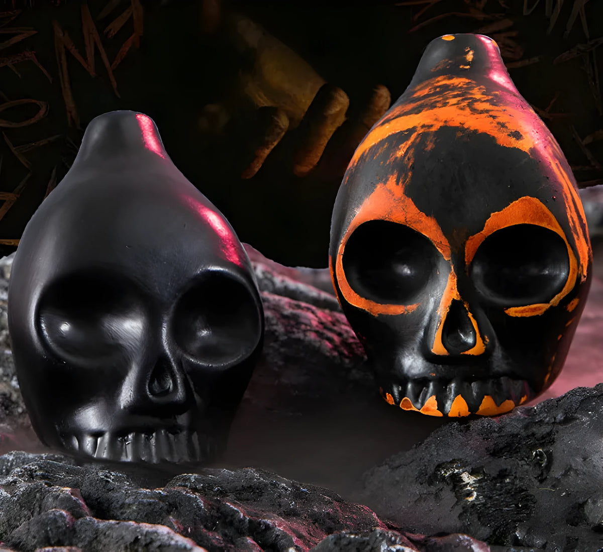 Skull whistle decompression toy in dolomite ceramic, shown in matte black and red and black colour options