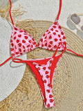 Women's pink strawberry print lace-up triangle bikini set with polyester-nylon fabric for swimming