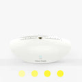 White noise sleep aid machine with mechanical controls showing timer buttons and USB port