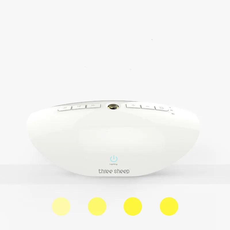 White noise sleep aid machine with mechanical controls showing timer buttons and USB port