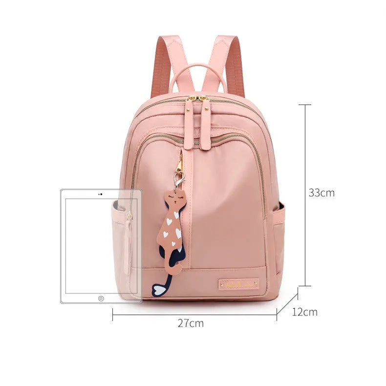 Men's black nylon casual backpack with double straps, a soft handle, and external pocket.