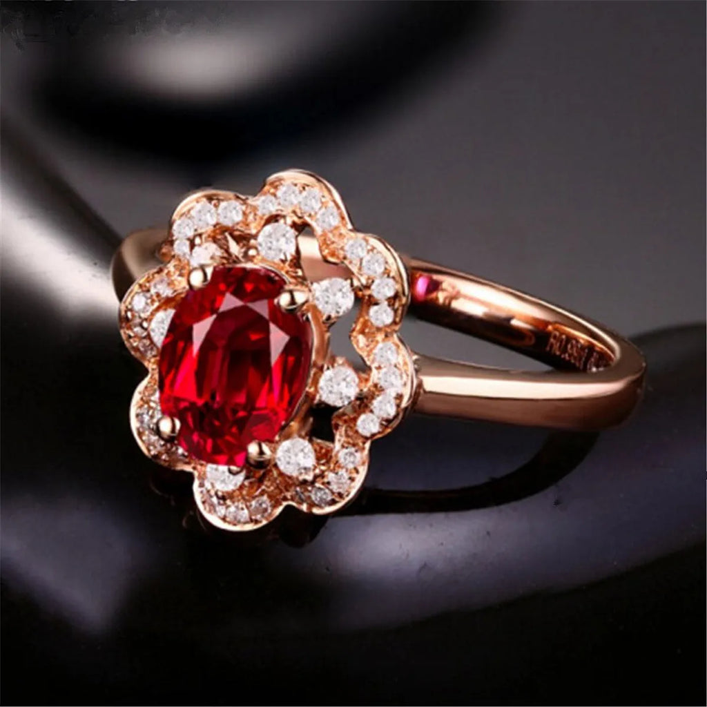 Silver rose gold adjustable ring with synthetic ruby stone on white background