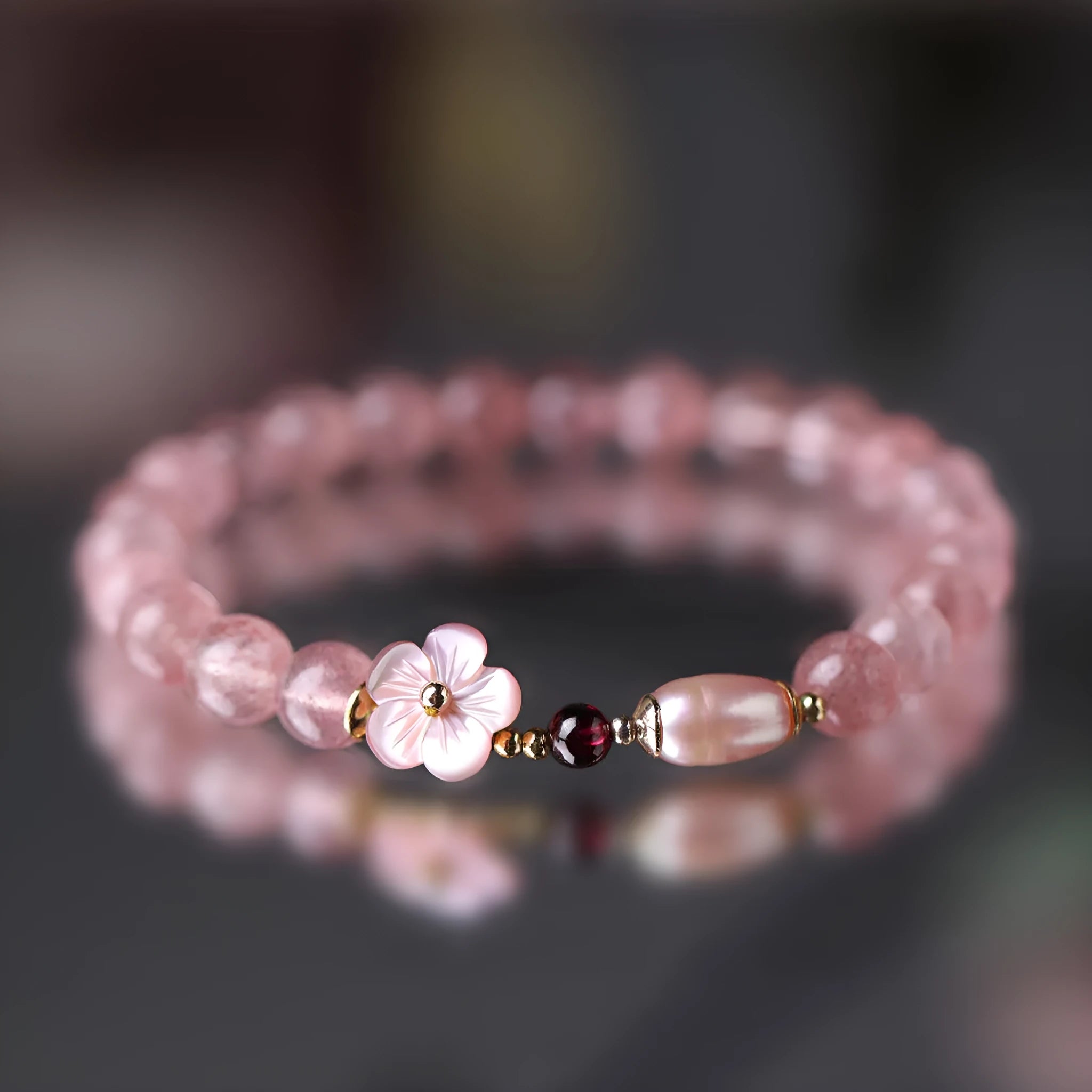 Strawberry quartz peach blossom crystal bracelet with floral design and adjustable cord