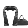 Grey electric massage shawl draped over shoulders for neck and back pain relief, with power cord attached