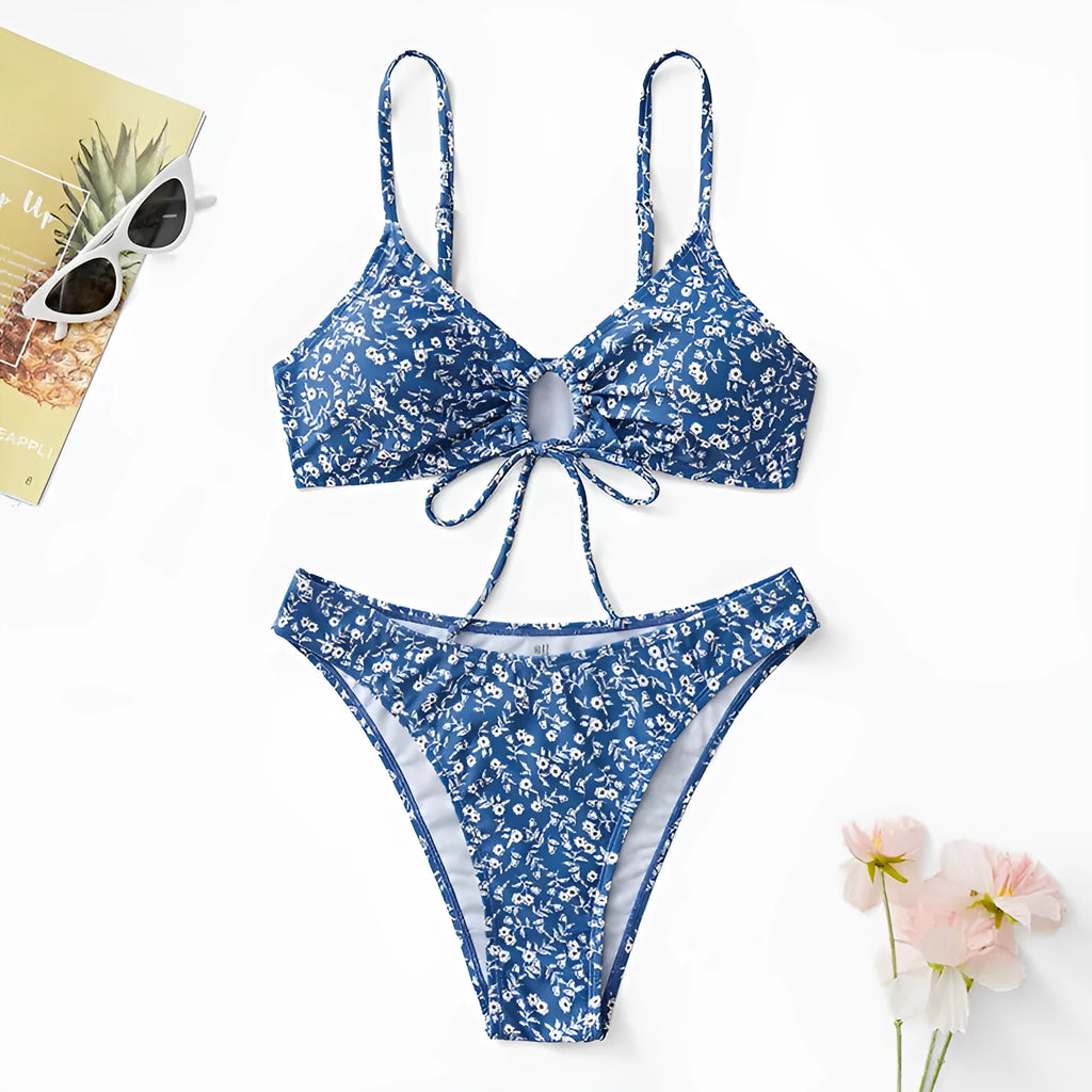Blue women's polyester swimsuit three-piece set showing top and shorts, no steel rings.