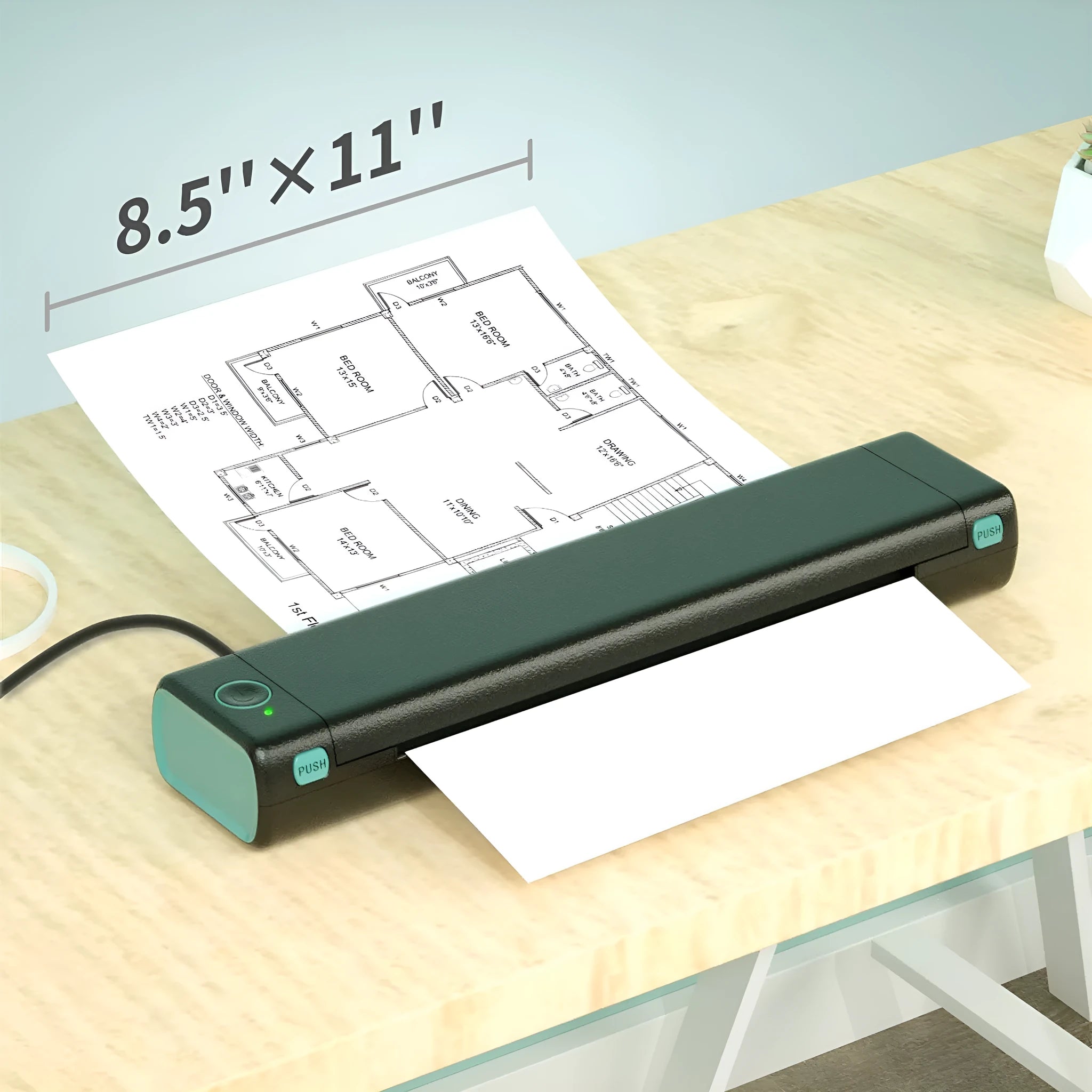Phomemo M08F A4 portable thermal printer in silver black colour on a desk
