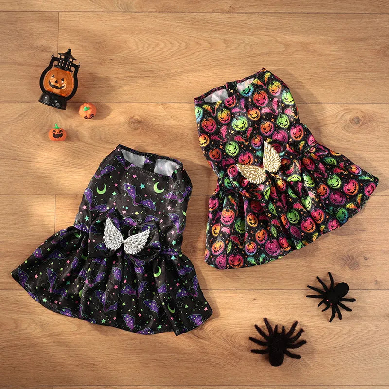 Halloween dog costume with angel wings in bright pumpkin orange and bat print patterns