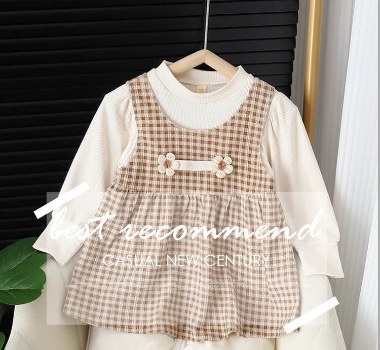 Baby girl wearing a dark coffee plaid long-sleeved dress and matching shirt, Korean style two-piece set.