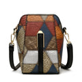 Soft PU shoulder bag with stitching detail, single strap, sandwich pocket, in irregular blue and black or blue and brown.