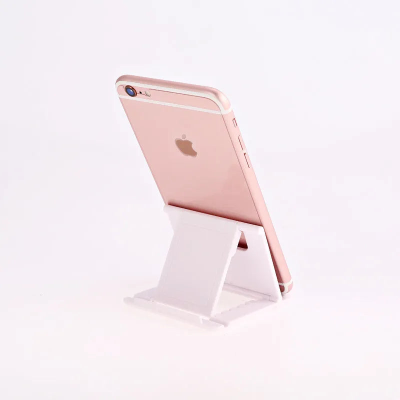 Folding mobile phone and tablet bracket in black, 83 x 71 x 7 mm, made from ABS and silicone