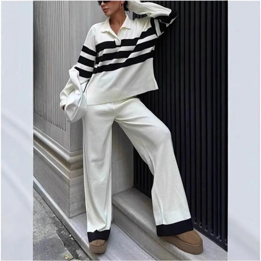 Women's black and white striped polo collar knit two-piece set with matching trousers