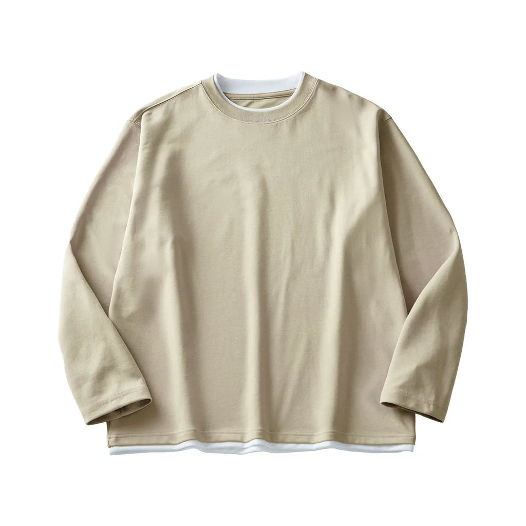 Men's loose fit long-sleeved cotton blend t-shirt in black, shown on a model.