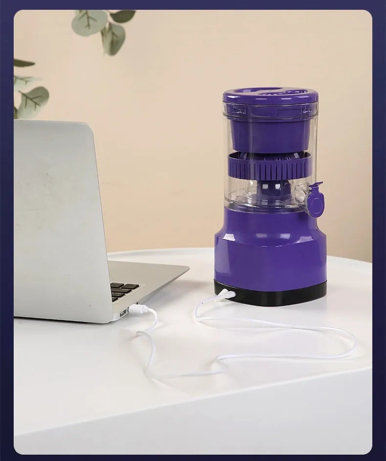 Purple USB rechargeable electric citrus juicer with detachable jug on a kitchen counter.