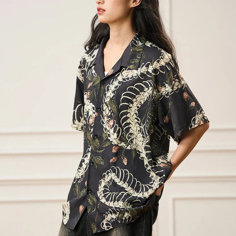 Original snake bone theme floral print on a loose, short sleeve Cuban collar shirt in assorted colours.