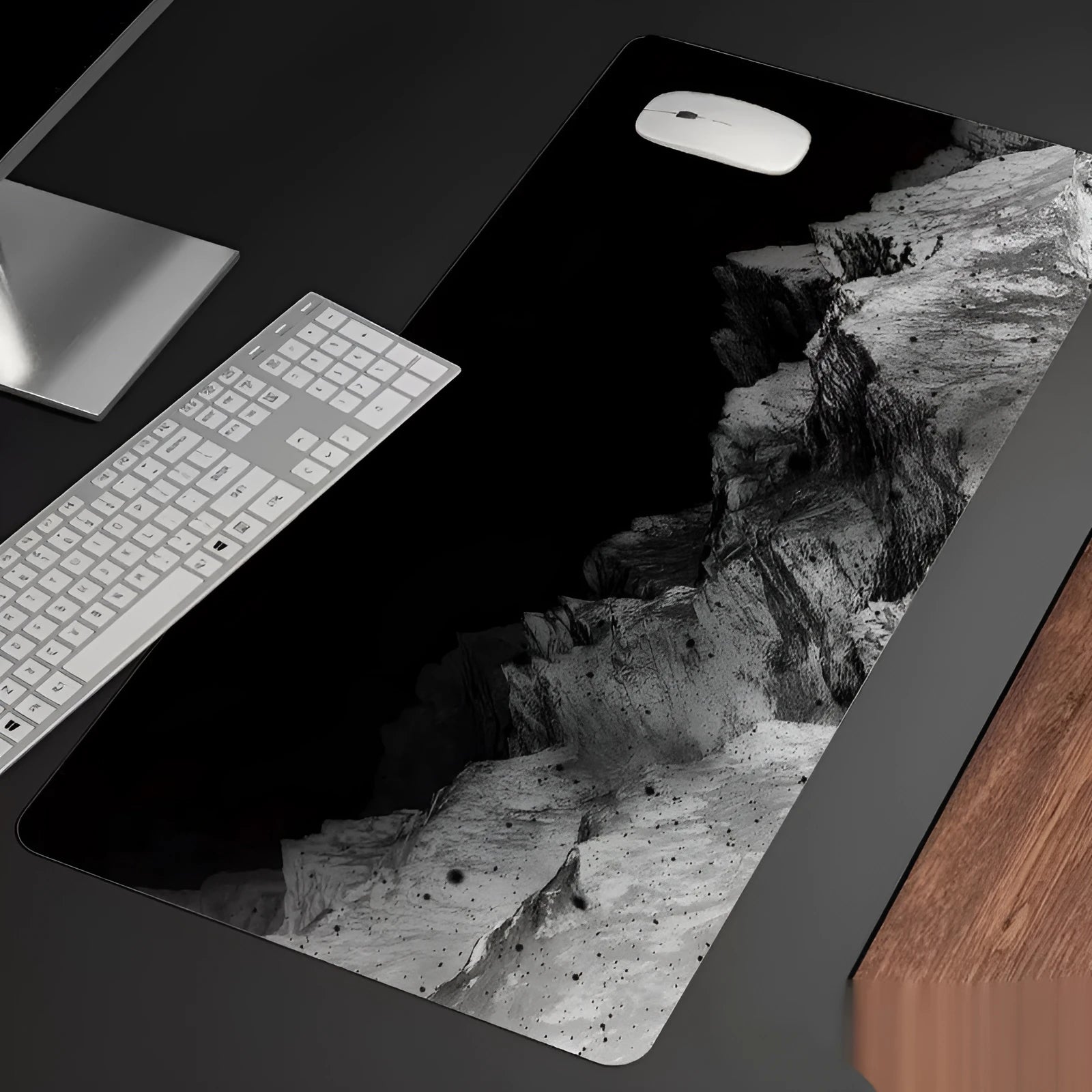 Oversized gaming mouse pad with cold style graphic design on natural rubber base for desk placement