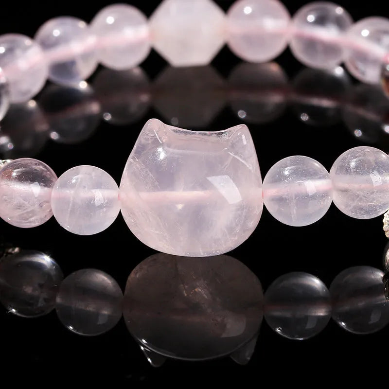 Women's natural crystal bracelet collection showing nine different designs including cat head, bear, and snowflake motifs
