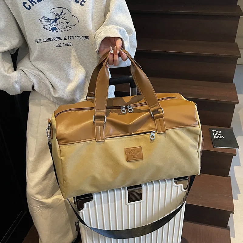 Large capacity oxford cloth messenger bag in black, blue, or khaki colours with breathable lining