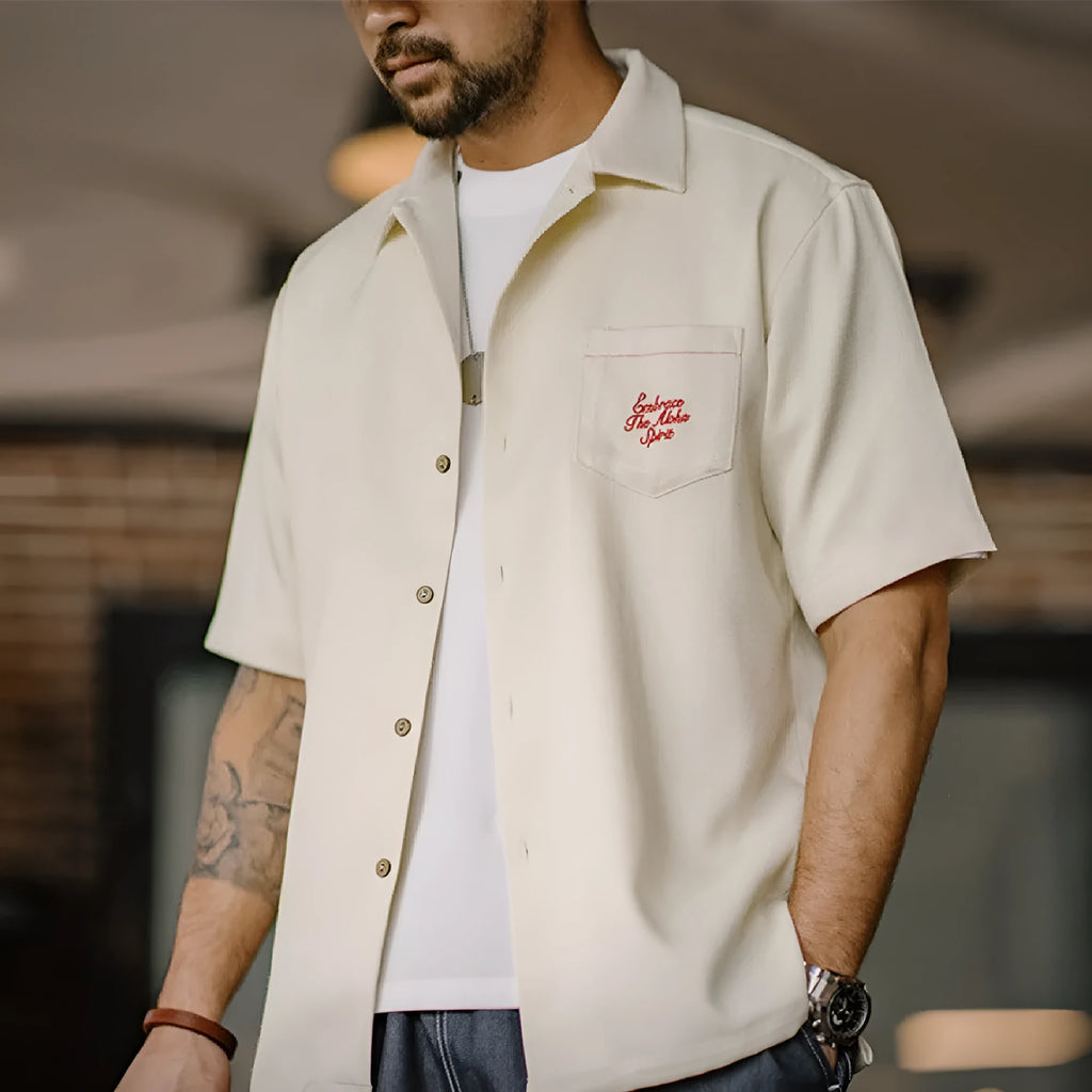 Light apricot men's shirt with bamboo and floral pattern and a Cuban collar