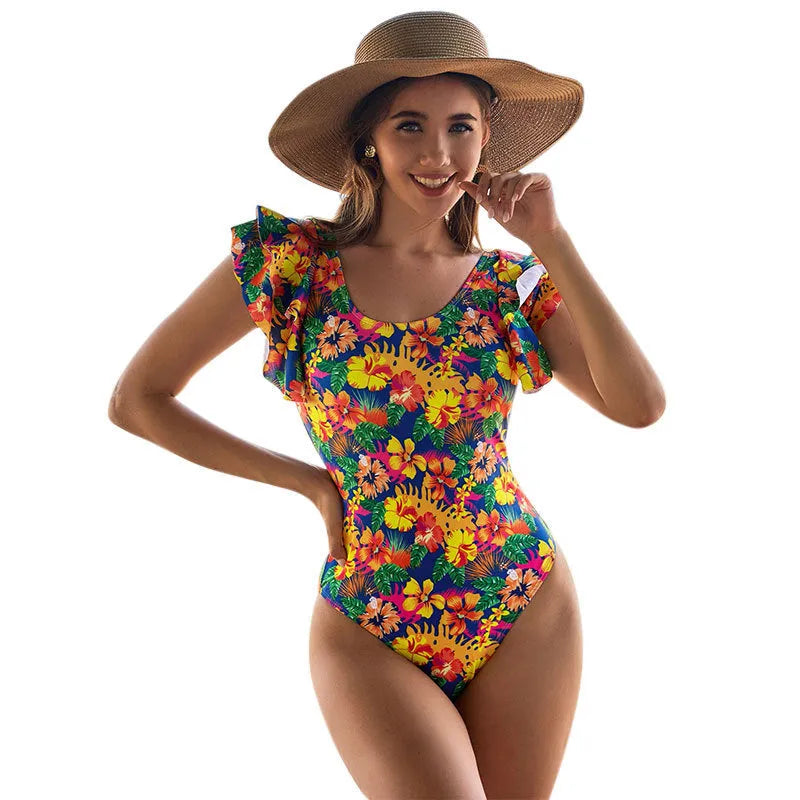 Women's one-piece swimsuit with U-shaped collar and lace detail on polyester fabric.