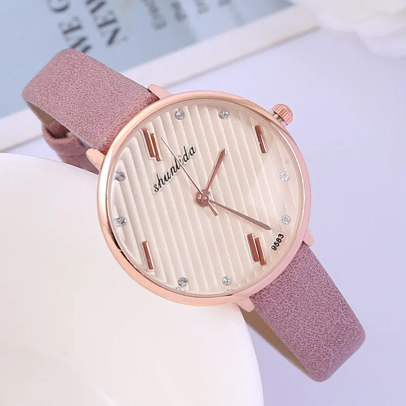 Student watch with round dial, 32mm diameter, pin buckle, available in five colours
