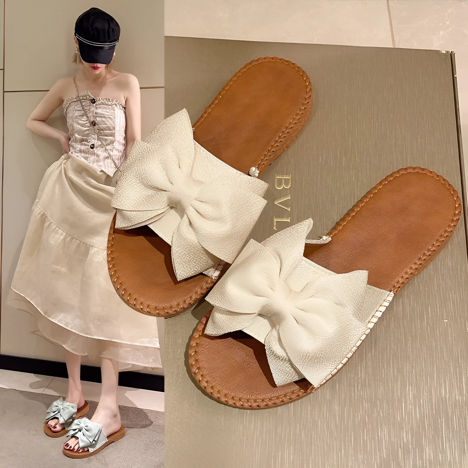 Women's beige suede slip-on sandals with a bow and flat soft rubber sole.