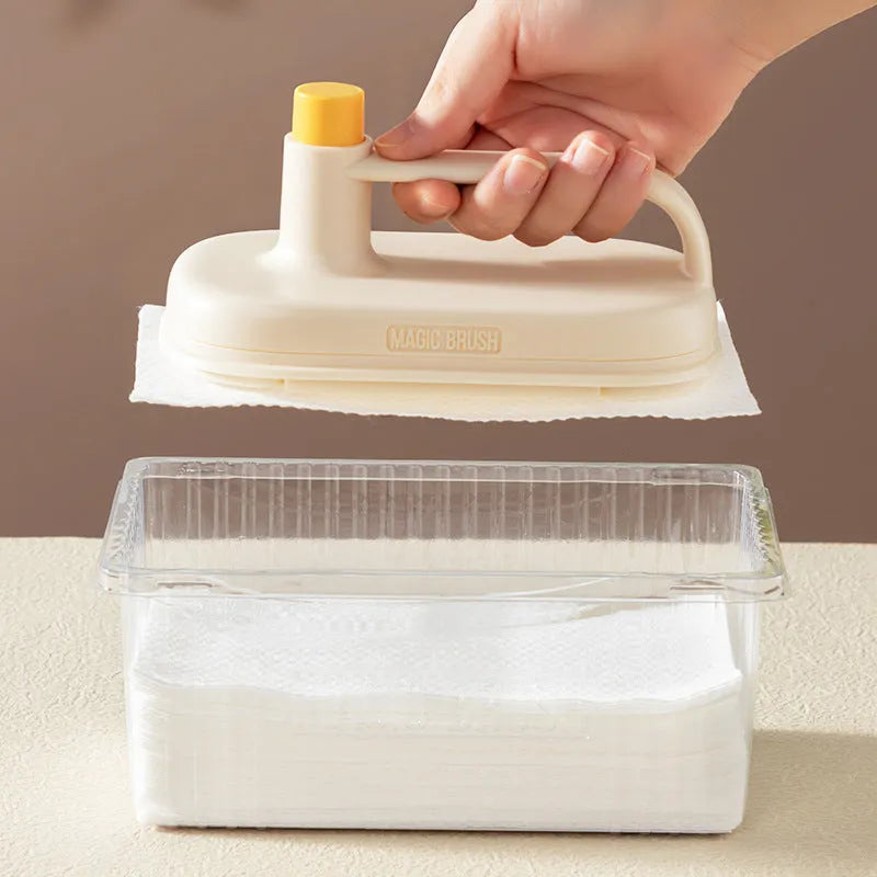 Magic disposable cleaning brush with plastic handle and packet of 50 white non-woven fabric refill wipes.