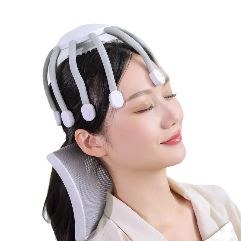 Black handheld head massager with multiple vibrating nodes for scalp stimulation