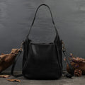 Solid colour women's cross-body bag in brown genuine first layer cowhide with sandwich pocket and single shoulder strap
