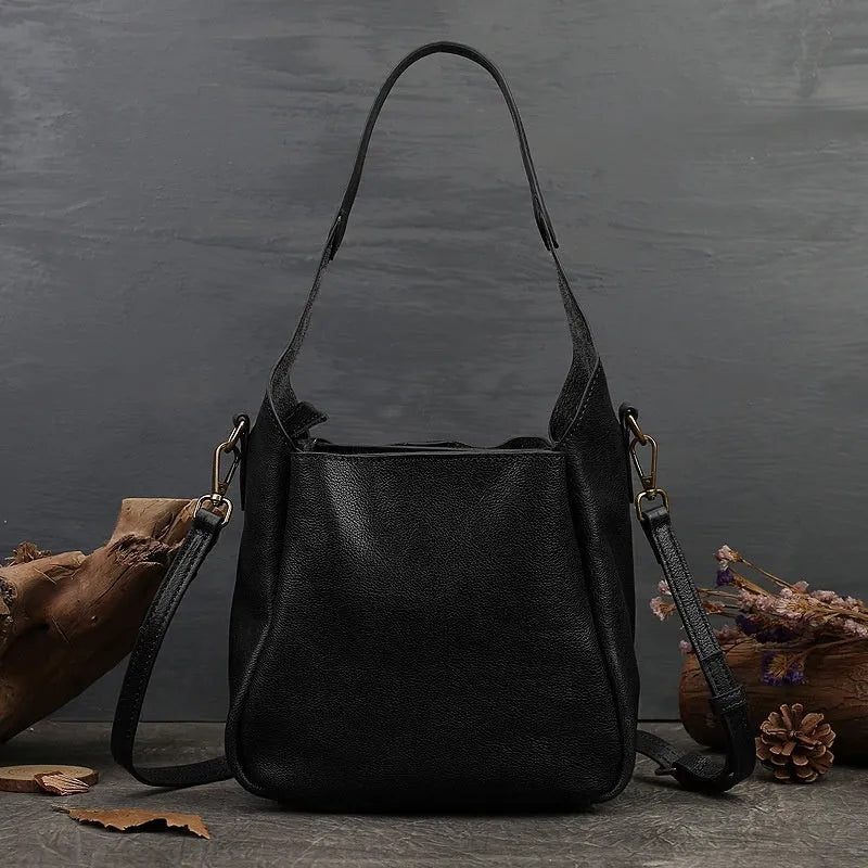 Solid colour women's cross-body bag in brown genuine first layer cowhide with sandwich pocket and single shoulder strap