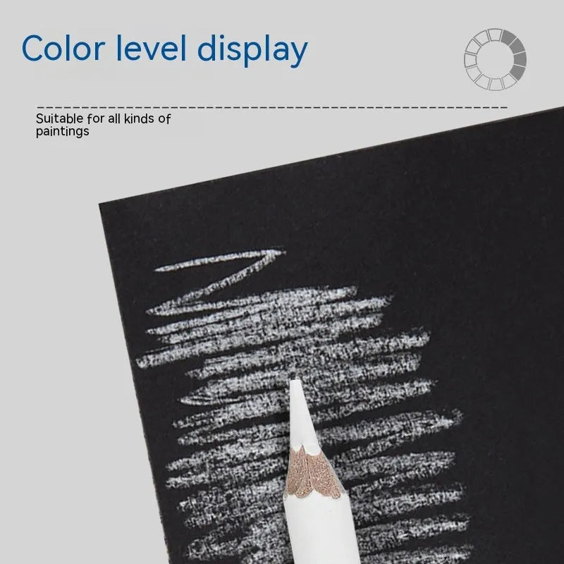 Three white charcoal pencils in wooden barrels for sketching and highlighting on dark papers
