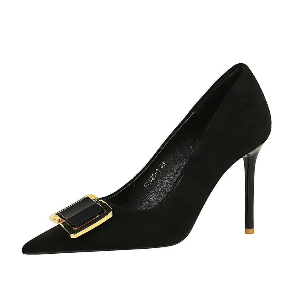 Black suede women's high-heel shoes with a 9cm stiletto heel and pointed toe on a plain background.
