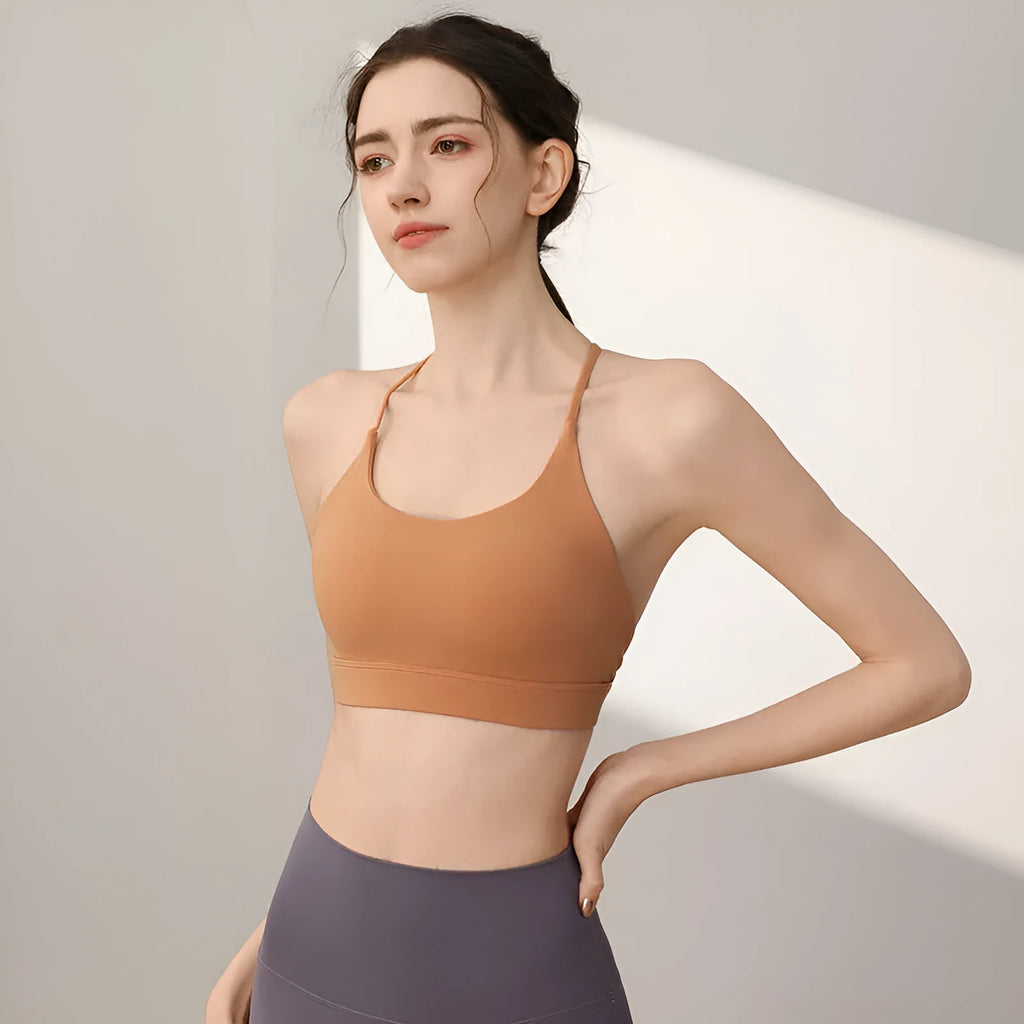 Women's nylon sports vest with fixed double shoulder straps in various colours for athletic activities