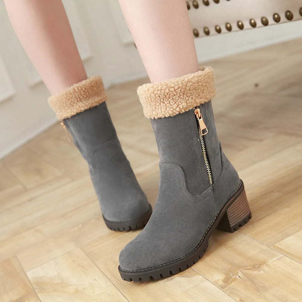 Snow boots with a plush lining and rubber insole in black, grey, green, and orange