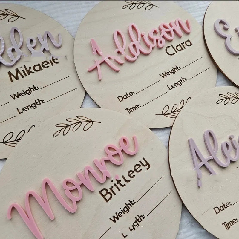 Square wooden baby name label displaying birth information with 15cm dimensions