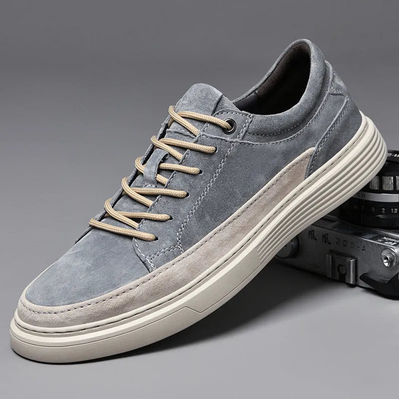 Men's casual leather skate shoes in grey colour with round toe and lace-up front