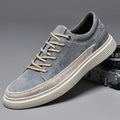 Men's casual leather skate shoes in grey colour with round toe and lace-up front