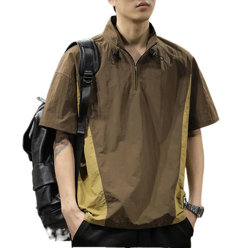 Brown men's half-zipped stand collar short-sleeved shirt on a hanger, showing fleece lining.