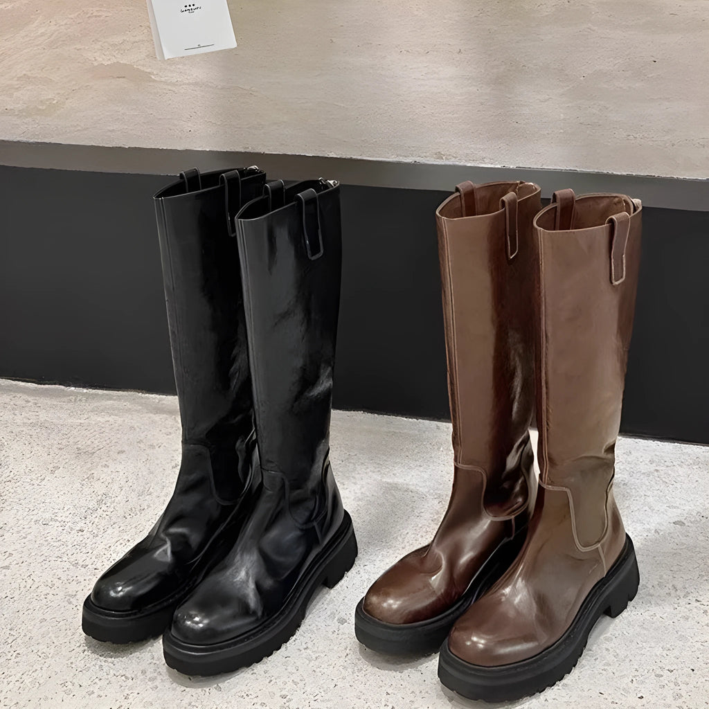 Women's black knee high chunky heel boots with round toe and back zipper.