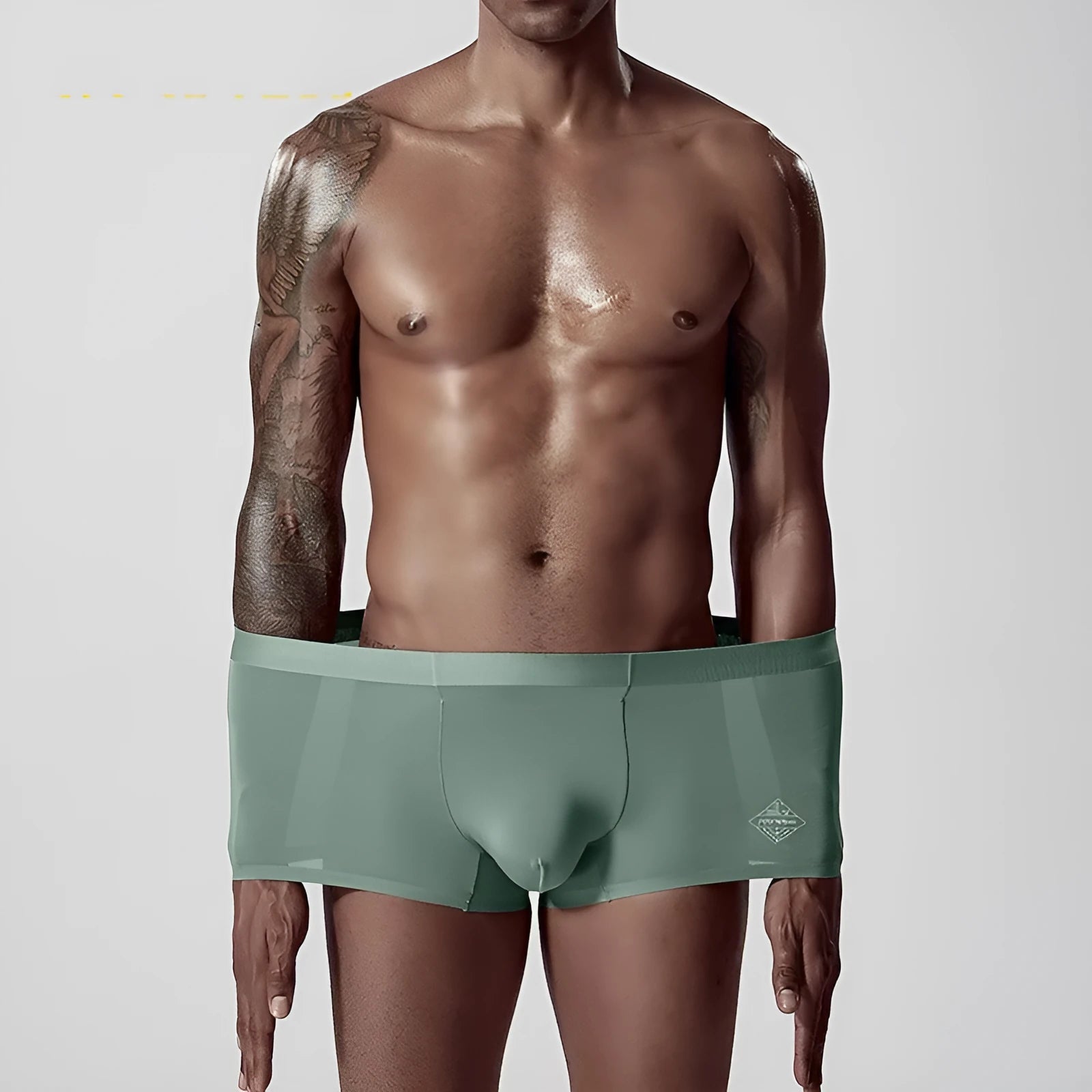 Men's seamless modal underwear in white, pink, green colours showing mid waist fit
