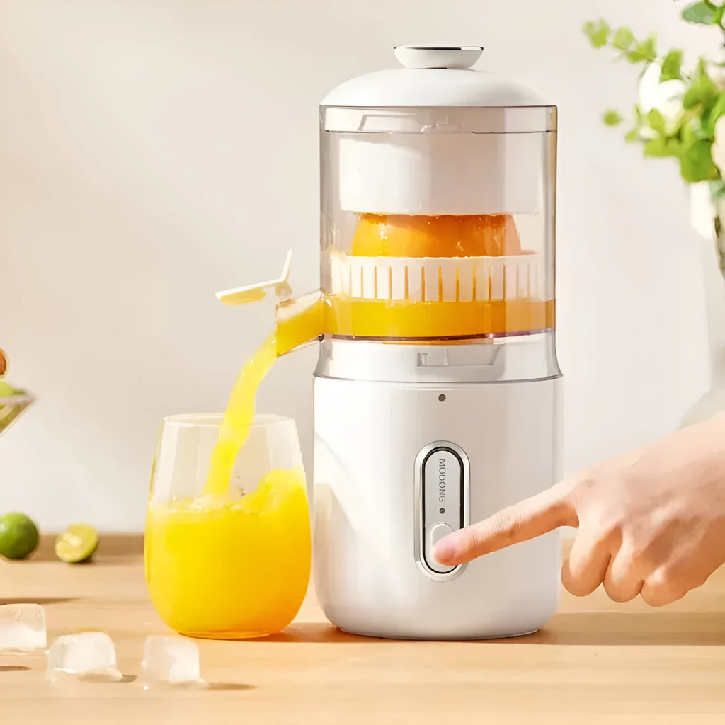Portable electric citrus juicer in fresh green with USB charging cable and cleaning brush