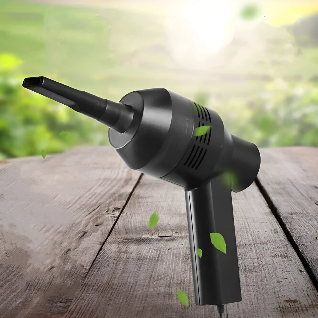 Black handheld desktop mini vacuum cleaner for cleaning keyboards and cars.