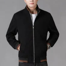 A grey men's sports-style fleece jacket with a stick pocket and long sleeves.