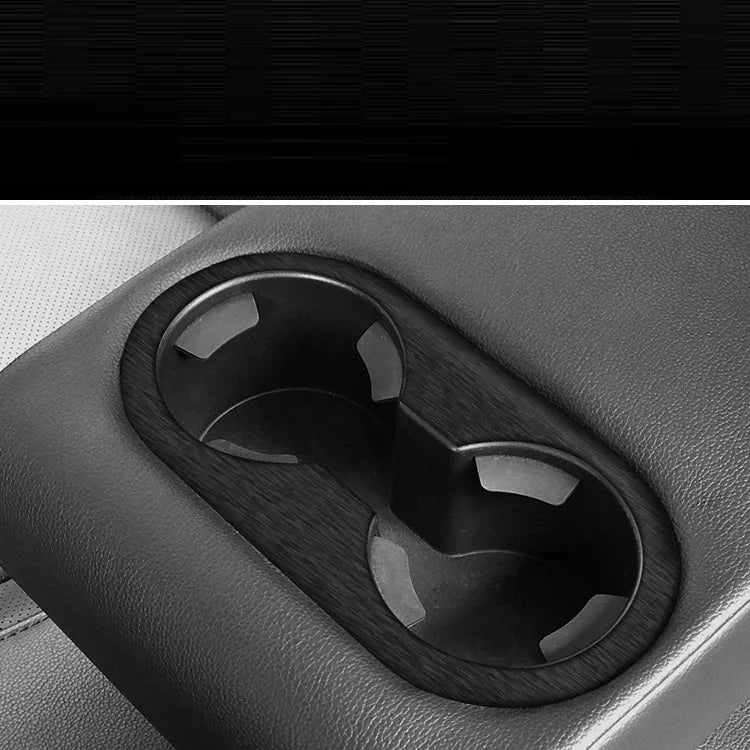 Car interior decorative film sticker kit showing dashboard and centre console pieces for automotive modification
