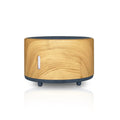 Bluetooth remote controlled humidifier and aromatherapy diffuser with LED flame effect in three colour finishes.
