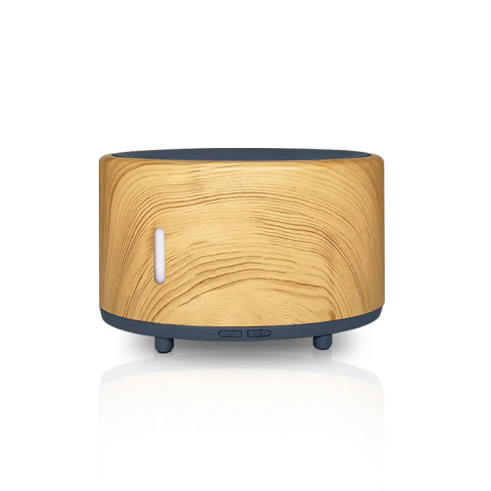 Bluetooth remote controlled humidifier and aromatherapy diffuser with LED flame effect in three colour finishes.