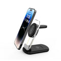Transparent folding 3-in-1 magnetic wireless charger in black on a desk