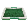 Green artificial turf dog toilet tray measuring 60cm by 40cm for indoor puppy potty training.