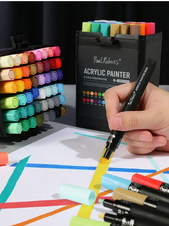 Rubens white acrylic marker with single head nib on a plastic surface