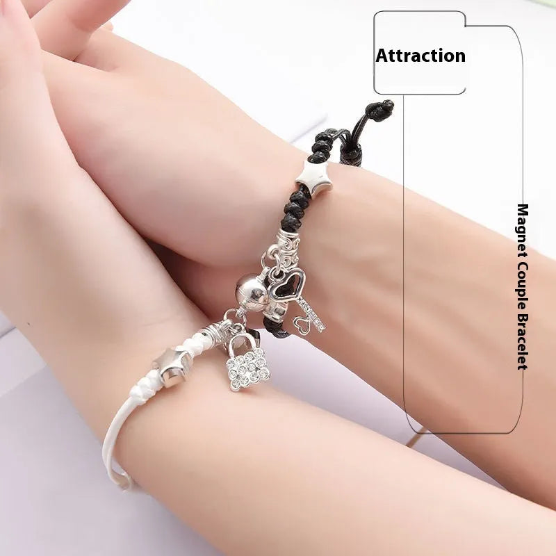 Pair of adjustable alloy magnet bracelets showing designs like a golden key lock, clover, and T5201314 code.