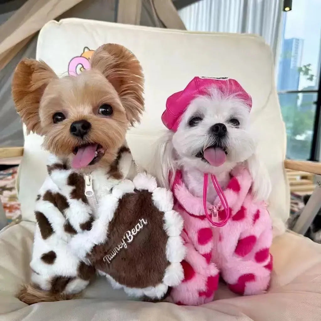 Small pink plush dog coat on a mannequin, showing British-style design for breeds like Teddy or Pomeranian.